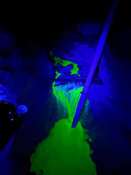 Fluorescein injection under blacklight in Great Onyx Cave.